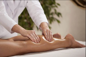Football Player Experiencing Deep Tissue Massage