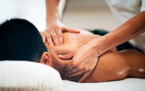 Close-up of young woman having reflexology
